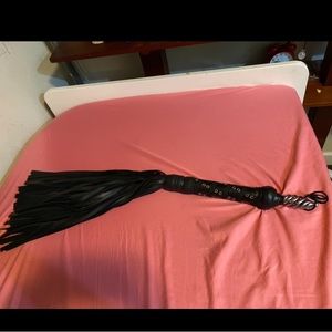 Custom made flogger. Real leather and silver. Have fun! 😉